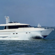 Challenger luxury motor yacht cruising on open water, built by Royal Hakvoort Shipyard