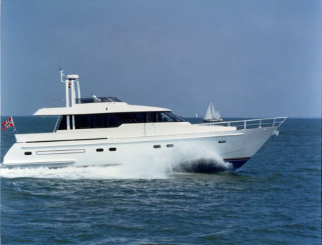 Challenger luxury motor yacht cruising on open water, built by Royal Hakvoort Shipyard